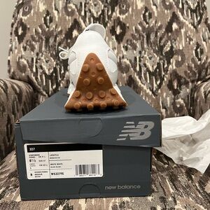 Brand new, solid white New Balance 327, never worn. Size 6.5